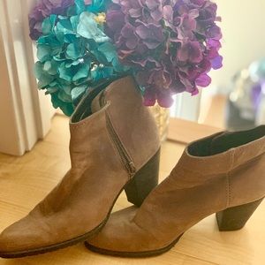 Neutral heeled booties